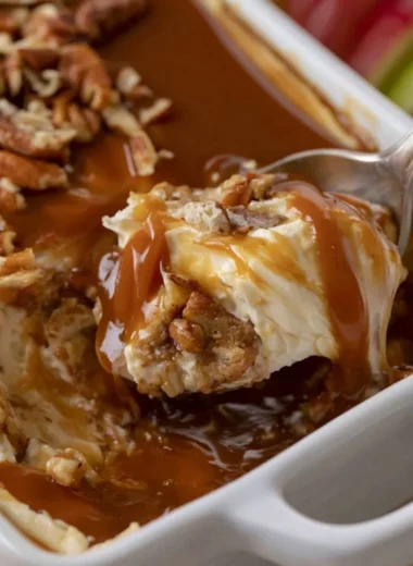 Delicious Caramel Apple Cheesecake Dip served with apple slices