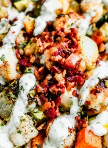 Delicious chicken bacon ranch salad with crispy bacon and creamy dressing