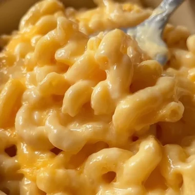 Cozy bowl of microwave macaroni and cheese topped with parsley