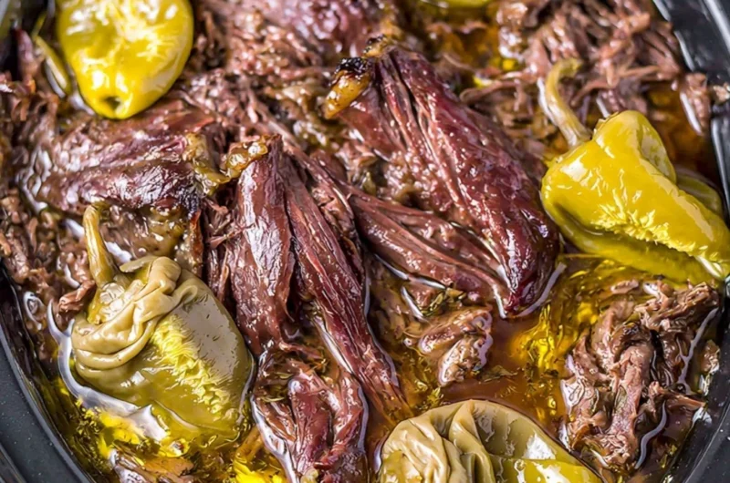Delicious Crockpot Mississippi Pot Roast served with vegetables on a plate
