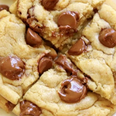 Freshly baked Crumbl chocolate chip cookies with gooey chocolate chunks