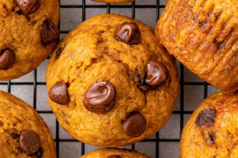 Freshly baked easy mini pumpkin muffins on a cooling rack