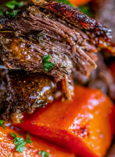 Delicious easy slow cooker pot roast with vegetables and herbs