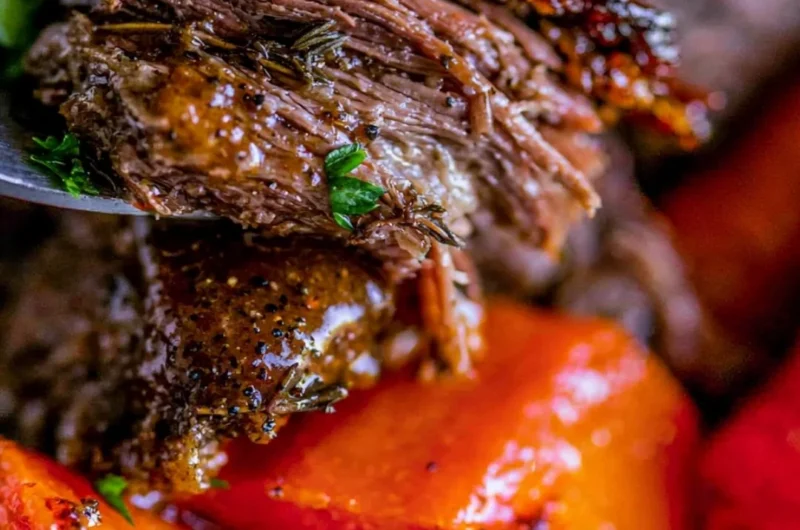 Delicious easy slow cooker pot roast with vegetables and herbs