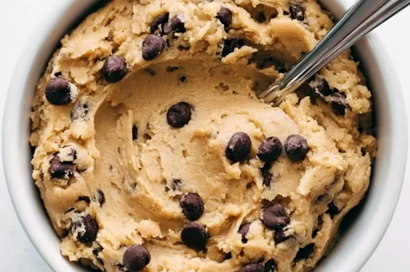 Bowl of delicious edible cookie dough with chocolate chips