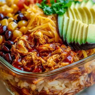 High-protein chicken enchilada bowls garnished with fresh herbs and avocado