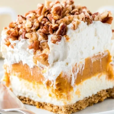 Delicious Pumpkin Lush dessert layered with cream and pumpkin flavors.