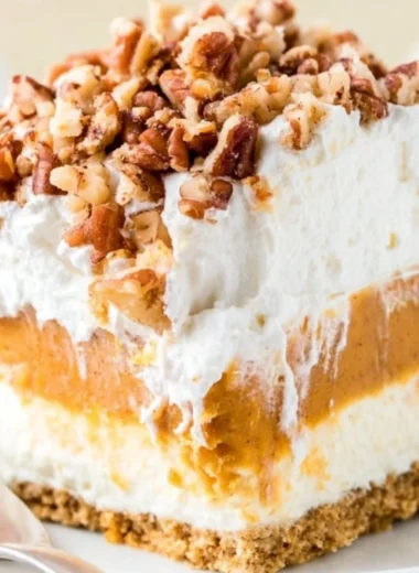 Delicious Pumpkin Lush dessert layered with cream and pumpkin flavors.