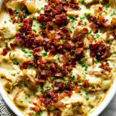 Savory creamy chicken potato casserole with cheese and herbs