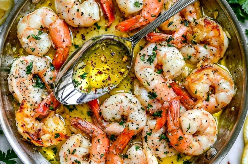 Delicious plate of Shrimp Scampi with garlic butter sauce and fresh herbs