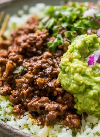 Whole30 Chipotle Beef and Avocado Bowls on a plate ready to be enjoyed