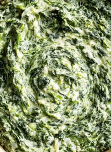 Delicious creamed spinach in a bowl, ready to serve as a side dish