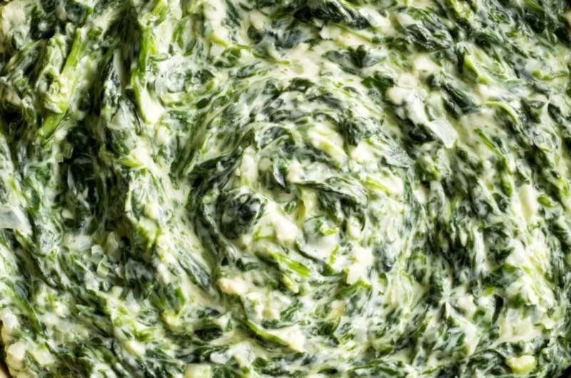 Delicious creamed spinach in a bowl, ready to serve as a side dish