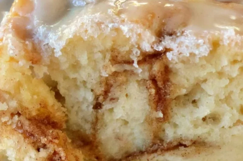 Delicious homemade cinnamon roll cake with cinnamon swirls on top