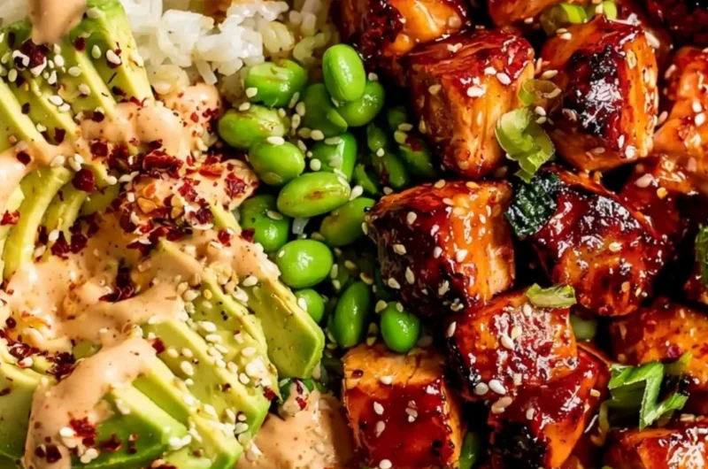 Honey Sriracha Salmon Bowl with fresh vegetables and rice