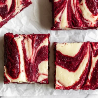 Red Velvet Cheesecake Brownies showcasing fudgy texture and creamy cheesecake swirl