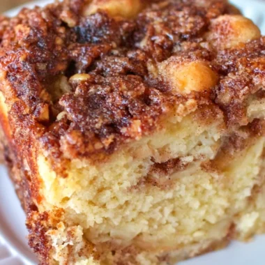 Deliciously moist Apple Sour Cream Cake with layers of apples and creamy texture