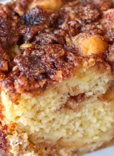 Deliciously moist Apple Sour Cream Cake with layers of apples and creamy texture