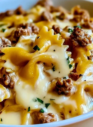 Delicious Beef and Bowtie Pasta with creamy Alfredo Sauce on a plate