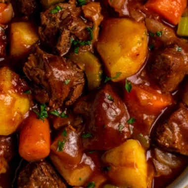 Delicious Crock Pot beef stew simmering in a cozy kitchen setting
