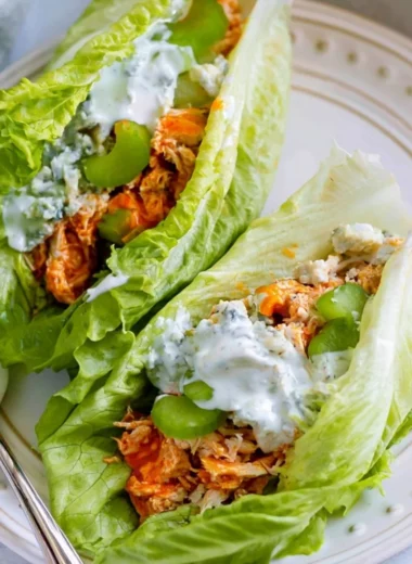 Healthy Buffalo Chicken Lettuce Wraps filled with spicy chicken and fresh vegetables