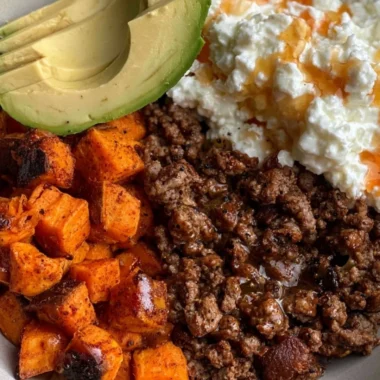 Delicious hot honey beef bowls with colorful veggies and rice