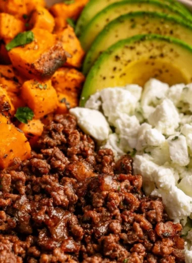 Hot Honey Sweet Potato Beef Bowls with ingredients in a colorful presentation