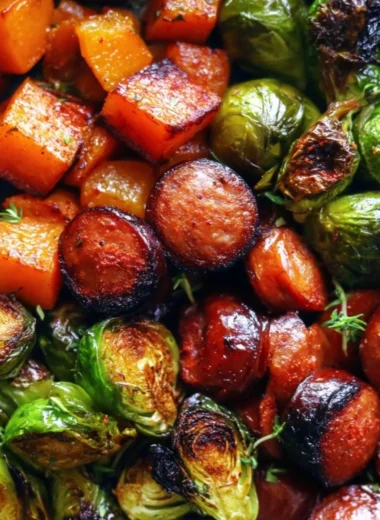 Sausage and veggies skillet with butternut squash and Brussels sprouts in a pan