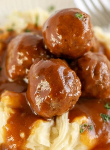 Delicious slow cooker Salisbury steak meatballs served with gravy