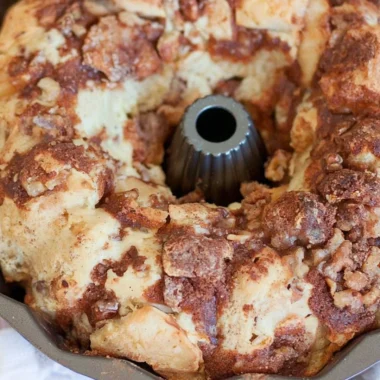Walnut and Apple Coffee Cake served with a cup of coffee
