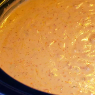 Creamy chorizo cheese dip in a crockpot, perfect for snacks and parties