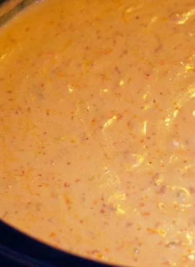 Creamy chorizo cheese dip in a crockpot, perfect for snacks and parties