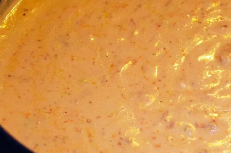 Creamy chorizo cheese dip in a crockpot, perfect for snacks and parties