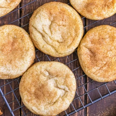 Plate of soft and chewy classic snickerdoodle cookies dusted with cinnamon sugar