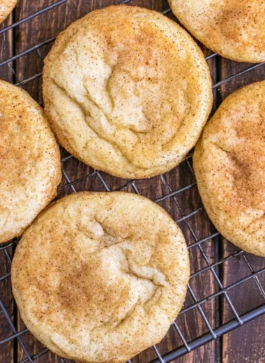 Plate of soft and chewy classic snickerdoodle cookies dusted with cinnamon sugar