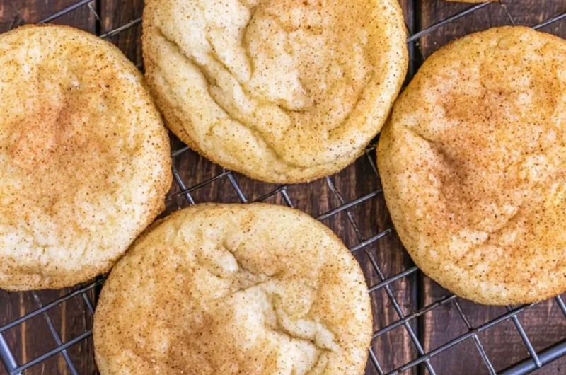 Plate of soft and chewy classic snickerdoodle cookies dusted with cinnamon sugar