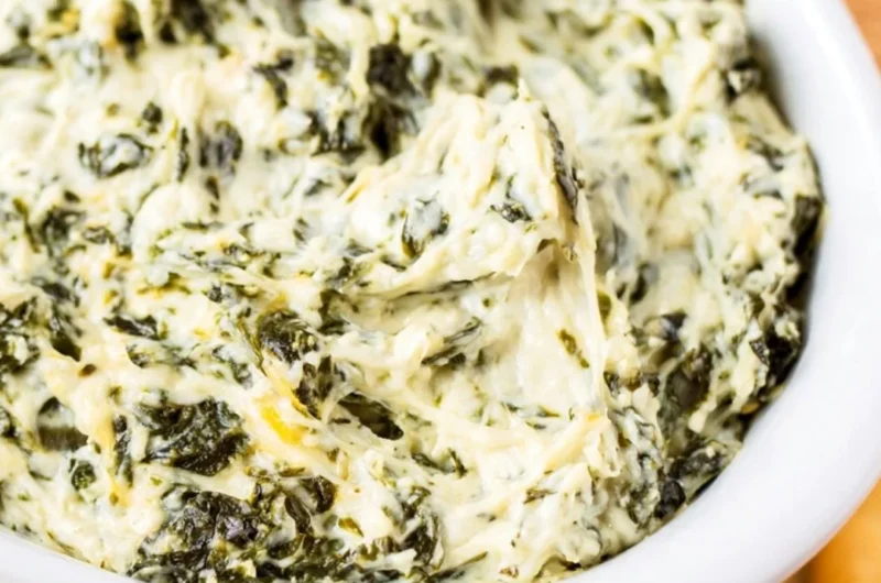 Creamy and delicious easy hot spinach dip served in a bowl