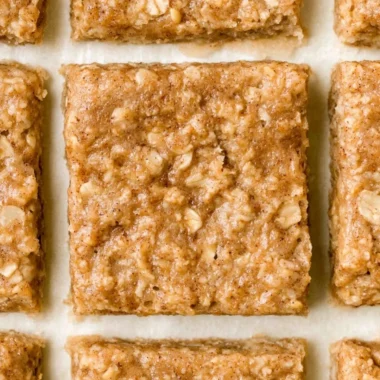 Homemade healthy breakfast bars on a wooden table.