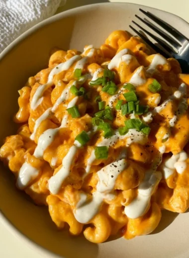 High protein buffalo chicken pasta dish with chicken and pasta in a creamy sauce