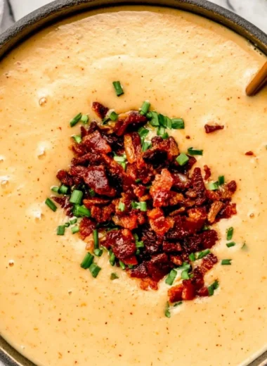 High-protein cream of potato soup served in a bowl with herbs on top