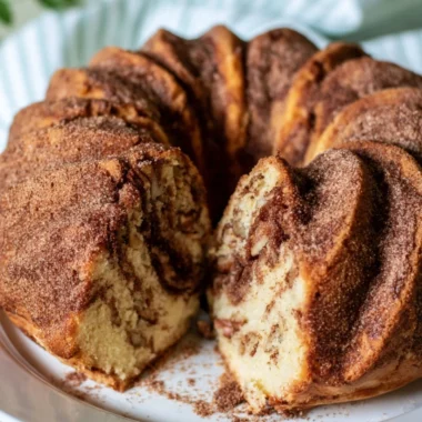 Moist cinnamon coffee cake topped with a cinnamon streusel topping