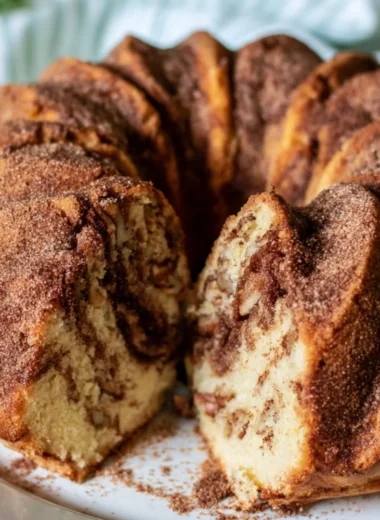 Moist cinnamon coffee cake topped with a cinnamon streusel topping