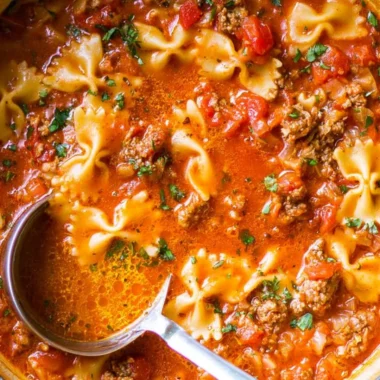 Delicious bowl of world's best lasagna soup with cheese and herbs