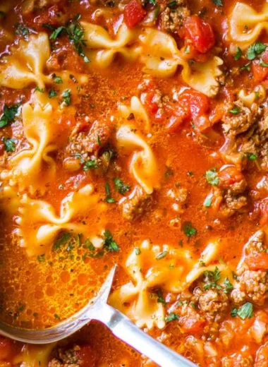 Delicious bowl of world's best lasagna soup with cheese and herbs