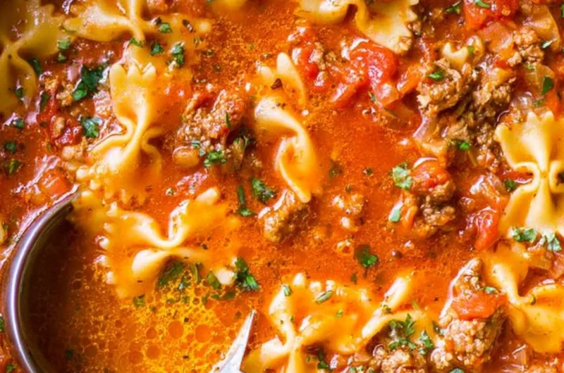 Delicious bowl of world's best lasagna soup with cheese and herbs